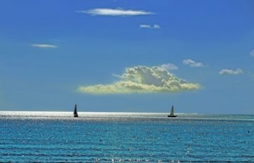 Boats sailing on the ocean: last stretch - Photo on Visualhunt
