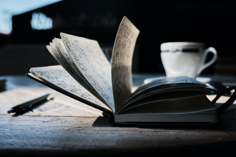 Time to eat the book and some coffee to add an extra flavour! Image on unsplash.